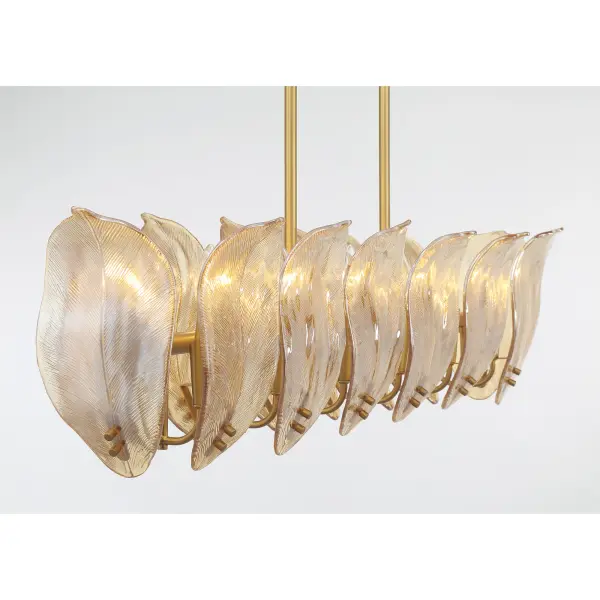The Orchid 48" island chandelier combines transitional elegance with artisanal craftsmanship. Featuring 14 candelabra lights housed in handmade amber glass shades and finished in legacy brass, it delivers warm, inviting illumination perfect for kitchen islands and dining spaces. - alternate view