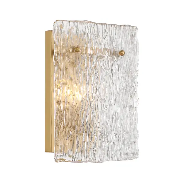 The Brookstreet wall sconce combines warm legacy brass finish with artisan handmade glass for a refined look. At 11" high, it's perfectly scaled for bathrooms, hallways, and intimate spaces requiring sophisticated accent lighting.