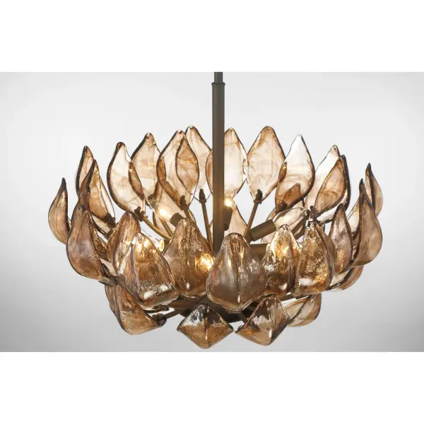 The Arboles 6-Light Pendant combines handcrafted amber glass shades with a sophisticated Heritage Bronze finish, creating a warm, inviting ambiance. Its 24-inch width makes it versatile for medium-sized spaces while the artisanal glass adds organic character. - alternate view