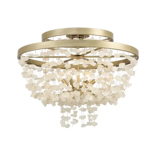 Robin Baron's Stonybrook collection brings organic luxury to modern interiors. This 6-light flush mount pairs warm Harvest Gold steel with natural crystalline quartz for a sophisticated, nature-inspired aesthetic.