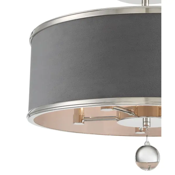 The Luxour combines sophisticated polished nickel with plush steel grey velvet and glass orbs for a refined transitional look. Its convertible design offers flexibility for various ceiling heights and room configurations. - alternate view