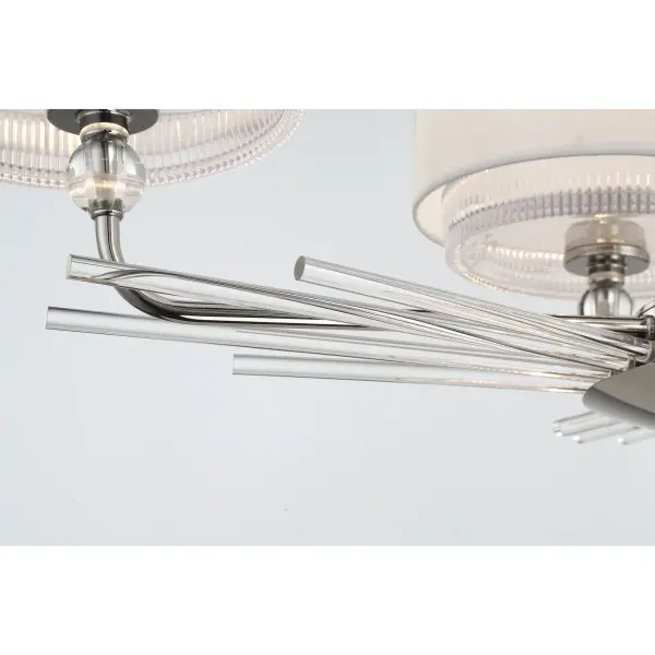 The Sutton collection by Robin Baron brings refined traditional elegance to kitchen islands and dining spaces. Four silk-wrapped shades in polished nickel create a sophisticated linear statement that balances classic design with contemporary proportions. - alternate view