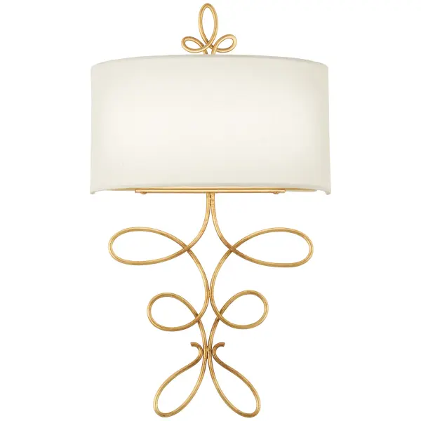 The Gianella wall sconce combines luxurious gold leaf finish with soft white linen shading for sophisticated ambient lighting. Energy-efficient LED technology delivers warm, high-CRI illumination perfect for residential and hospitality settings.