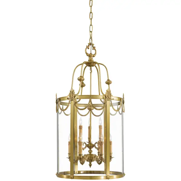 This impressive 9-light foyer pendant combines Old World craftsmanship with transitional elegance. Handcrafted in Spain from solid cast brass with a luxurious Doré Gold finish and clear glass panels, it creates a stunning focal point.