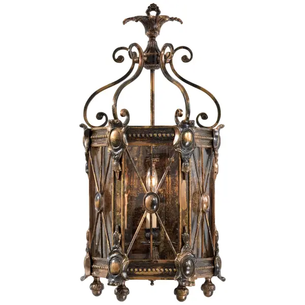 This elegant 3-light wall sconce brings Old World charm with its handcrafted Italian construction, bronze oxide finish, and distinctive drip candle sleeves. The clear glass and traditional styling create warm ambiance perfect for formal spaces.