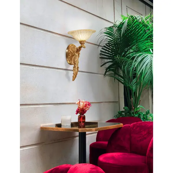 This Metropolitan wall sconce showcases Old World craftsmanship with its handcrafted Spanish design and authentic white Murano glass shade. The French Gold finish adds warmth and sophistication to any space. - alternate view