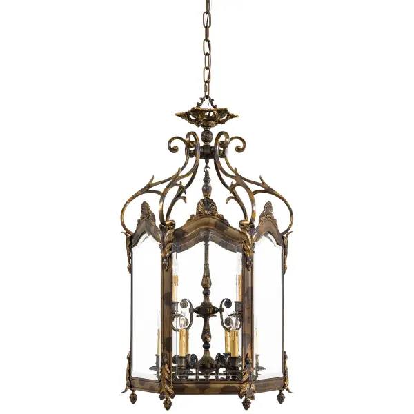 This handcrafted Italian pendant brings European sophistication to grand entryways with its lost wax casting technique and oxide brass finish. Nine candelabra lights behind clear beveled glass create dramatic illumination.
