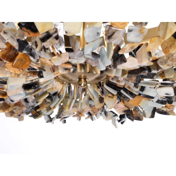 The Flotsam 8-Light Pendant combines organic beauty with contemporary design, featuring multi-color river agate stones set in a warm brass finish. This substantial fixture creates a dramatic focal point perfect for dining rooms and grand entryways. - alternate view