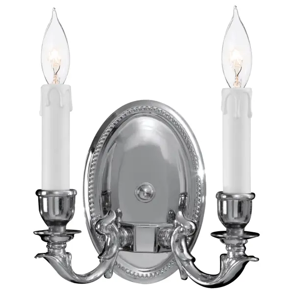 This handcrafted wall sconce from Spain combines transitional elegance with practical functionality. The polished chrome finish and cast steel arms deliver timeless appeal, while ADA compliance makes it ideal for accessible spaces.