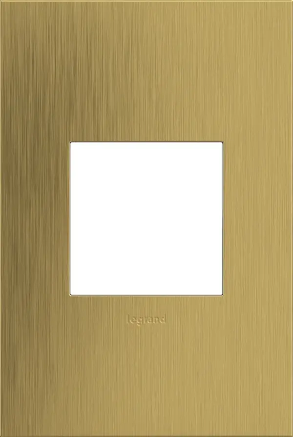 Classic brass goes modern in a milder metallic that transforms spaces with understated elegance. A 1-Gang Wall Plate, it is perfectly sized to fit a standard-sized adorne device, or any combination of two half-sized adorne designer switches or outlets. Collection: adorne Finish: Brushed Satin Brass Width: 3.45" Height: 5.13" Length: 0.35" Weight: 0.31 lb Extension from Wall: 1.00" Material: Cast Metals Country of Origin: Mexico Connection: Screwless Manufacturer Warranty: Limited Lifetime