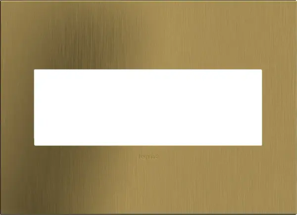 Classic brass goes modern in a milder metallic that transforms spaces with understated elegance. A 1-Gang Wall Plate, it is perfectly sized to fit a standard-sized adorne device, or any combination of two half-sized adorne designer switches or outlets. Collection: adorne Finish: Brushed Satin Brass Width: 7.06" Height: 5.13" Length: 0.35" Weight: 0.59 lb Extension from Wall: 1.00" Material: Cast Metals Country of Origin: Mexico Connection: Screwless Manufacturer Warranty: Limited Lifetime