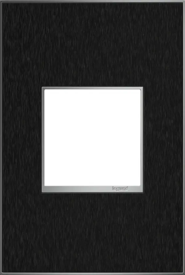 The consummate finish for any contemporary space, and a perfect match for many modern appliances. Made exclusively for use with designer switches and outlets from the adorne Collection. Collection: adorne Finish: Black Stainless Width: 3.45" Height: 5.13" Length: 0.35" Weight: 0.31 lb Extension from Wall: 1.00" Material: Real Materials Country of Origin: Mexico Connection: Screwless Manufacturer Warranty: Limited Lifetime