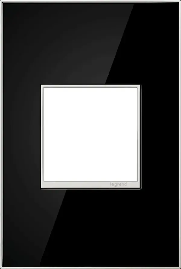 Modern and dramatic, add a luxurious feel to any room with this dark reflective finish. A 2-Gang Wall Plate, it is perfectly sized to fit any combination of up to two standard-sized adorne devices, or up to four half-sized adorne designer switches and outlets. Collection: adorne Finish: Mirror Black Notes: Mirror Black 1 Gang 2Mod Wp Width: 3.45" Height: 5.13" Length: 0.35" Weight: 0.45 lb Extension from Wall: 0.35" Bulb Type: tbn Material: Real Materials Country of Origin: Mexico Connection: Screwless Manufacturer Warranty: Limited Lifetime