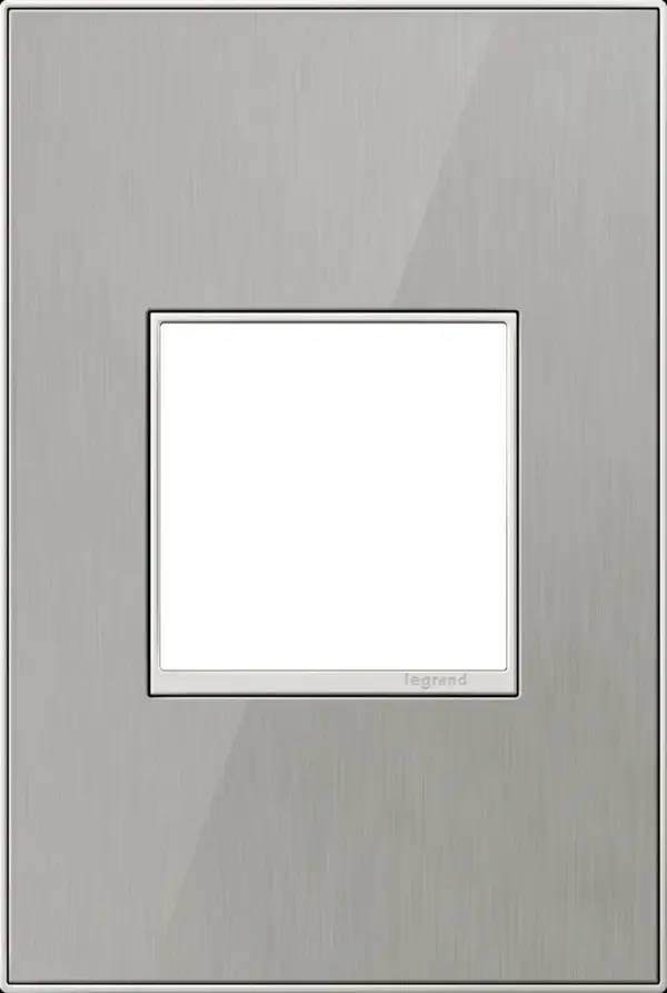 Stainless surface with satin nickel frame, for a trendy industrial touch that€s also sophisticated. A 1-Gang Wall Plate, it is perfectly sized to fit a standard-sized adorne device, or any combination of two half-sized adorne designer switches or outlets. Collection: adorne Finish: Brushed Stainless Notes: Brush Stainless 1 Gang 2Mod Wp Width: 3.45" Height: 5.13" Length: 0.35" Weight: 0.45 lb Extension from Wall: 1.19" Bulb Type: tbn Material: Real Materials Country of Origin: Mexico Connection: Screwless Manufacturer Warranty: Limited Lifetime