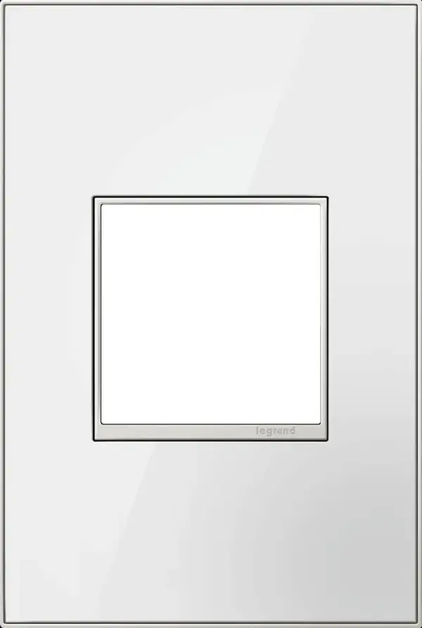 Providing a new twist on classic white, this sleek finish is sure to wow. A 3-Gang Wall Plate, it is perfectly sized to fit any combination of up to three standard-sized adorne devices, or up to six half-sized adorne designer switches and outlets. Collection: adorne Finish: Mirror White Notes: Mirror White 1 Gang 2Mod Wp Width: 3.45" Height: 5.13" Length: 0.35" Weight: 0.45 lb Extension from Wall: 0.35" Bulb Type: tbn Material: Real Materials Country of Origin: Mexico Connection: Screwless Manufacturer Warranty: Limited Lifetime