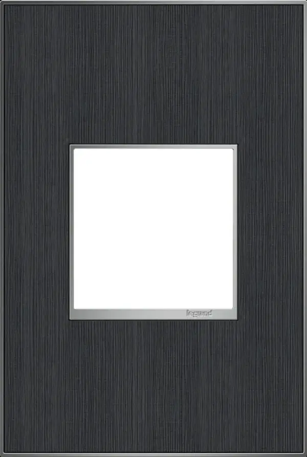 Who knew wall plates could seem so effortlessly handsome? Go for laidback style with cool-toned wood. A 4-Gang Wall Plate, it is perfectly sized to fit any combination of up to four standard-sized adorne devices, or up to eight half-sized adorne designer switches and outlets. Collection: adorne Finish: Rustic Gray Width: 3.45" Height: 5.13" Length: 0.35" Weight: 0.31 lb Extension from Wall: 1.00" Material: Real Materials Country of Origin: Mexico Connection: Screwless Manufacturer Warranty: Limited Lifetime