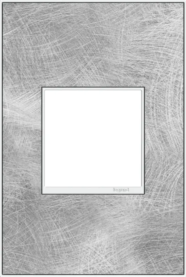 Sweeping strokes of monochromatic texture make this steel option all the more noteworthy. A 2-Gang Wall Plate, it is perfectly sized to fit any combination of up to two standard-sized adorne devices, or up to four half-sized adorne designer switches and outlets. Collection: adorne Finish: Spiraled Stainless Width: 3.45" Height: 5.13" Length: 0.35" Weight: 0.31 lb Extension from Wall: 1.19" Material: Real Materials Country of Origin: Mexico Connection: Screwless Manufacturer Warranty: Limited Lifetime