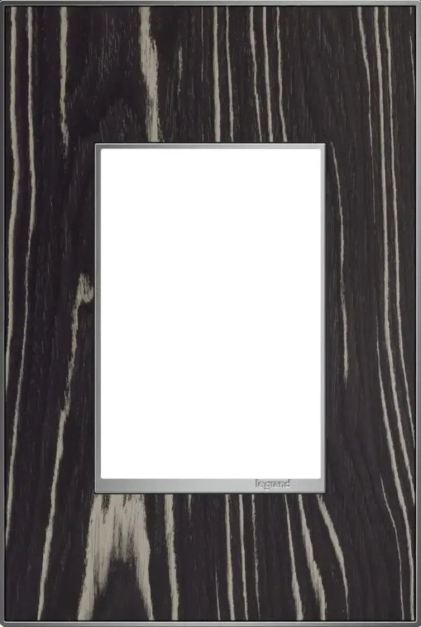 Beautiful and exotic ebony wood, and guaranteed to enhance the look and atmosphere of any room. A 3-Gang Wall Plate, it is perfectly sized to fit any combination of up to three standard-sized adorne devices, or up to six half-sized adorne designer switches and outlets. Collection: adorne Finish: Macassar Width: 3.45" Height: 5.13" Length: 0.35" Weight: 0.31 lb Extension from Wall: 1.00" Material: Real Materials Country of Origin: Mexico Connection: Screwless Manufacturer Warranty: Limited Lifetime
