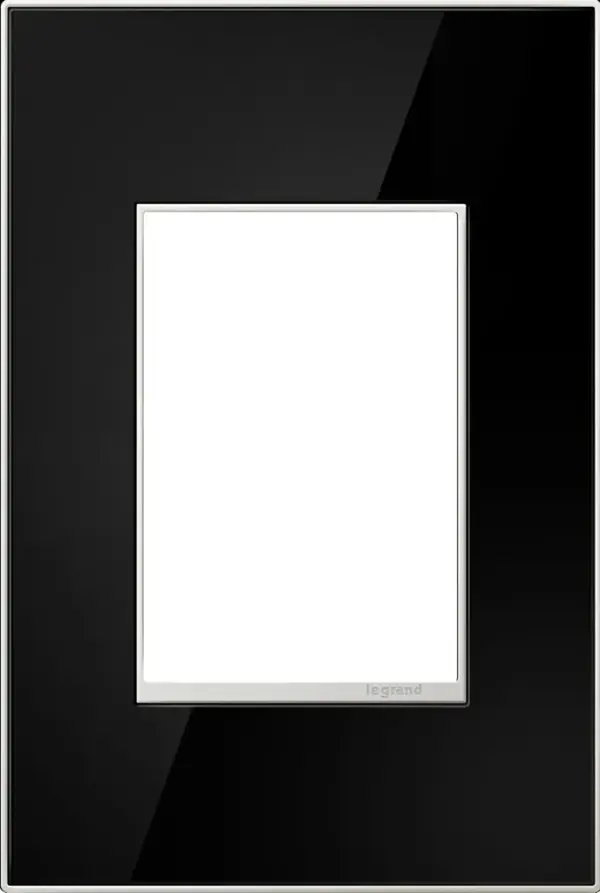 Modern and dramatic, add a luxurious feel to any room with this dark reflective finish. A 2-Gang Wall Plate, it is perfectly sized to fit any combination of up to two standard-sized adorne devices, or up to four half-sized adorne designer switches and outlets. Collection: adorne Finish: Mirror Black Notes: Mirror Black 1 Gang 3Mod Wp Width: 3.45" Height: 5.13" Length: 0.35" Weight: 0.43 lb Extension from Wall: 0.35" Bulb Type: tbn Material: Real Materials Country of Origin: Mexico Connection: Screwless Manufacturer Warranty: Limited Lifetime