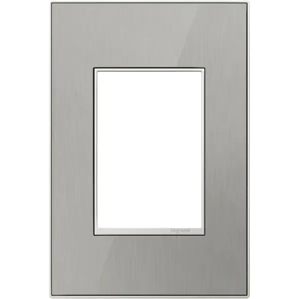 Stainless surface with satin nickel frame, for a trendy industrial touch that€s also sophisticated. A 1-Gang Wall Plate, it is perfectly sized to fit a standard-sized adorne device, or any combination of two half-sized adorne designer switches or outlets. Collection: adorne Finish: Brushed Stainless Notes: Brush Stainless 1 Gang 3Mod Wp Width: 3.45" Height: 5.13" Length: 0.35" Weight: 0.43 lb Extension from Wall: 1.19" Bulb Type: tbn Material: Real Materials Country of Origin: Mexico Connection: Screwless Manufacturer Warranty: Limited Lifetime