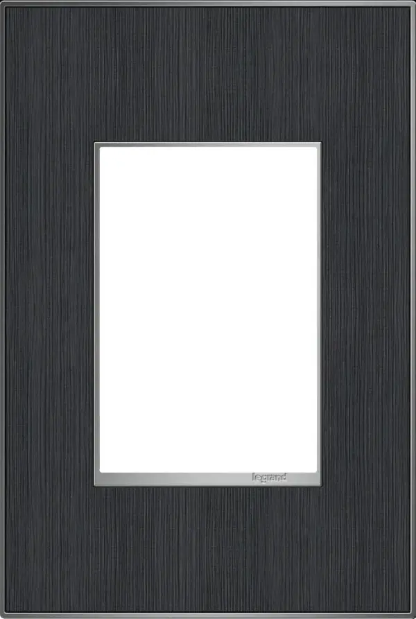 Who knew wall plates could seem so effortlessly handsome? Go for laidback style with cool-toned wood. A 4-Gang Wall Plate, it is perfectly sized to fit any combination of up to four standard-sized adorne devices, or up to eight half-sized adorne designer switches and outlets. Collection: adorne Finish: Rustic Gray Width: 3.45" Height: 5.13" Length: 0.35" Weight: 0.31 lb Extension from Wall: 1.00" Material: Real Materials Country of Origin: Mexico Connection: Screwless Manufacturer Warranty: Limited Lifetime