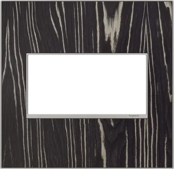 Beautiful and exotic ebony wood, and guaranteed to enhance the look and atmosphere of any room. A 3-Gang Wall Plate, it is perfectly sized to fit any combination of up to three standard-sized adorne devices, or up to six half-sized adorne designer switches and outlets. Collection: adorne Finish: Macassar Width: 5.29" Height: 5.13" Length: 0.35" Weight: 0.44 lb Extension from Wall: 1.00" Material: Real Materials Country of Origin: Mexico Connection: Screwless Manufacturer Warranty: Limited Lifetime