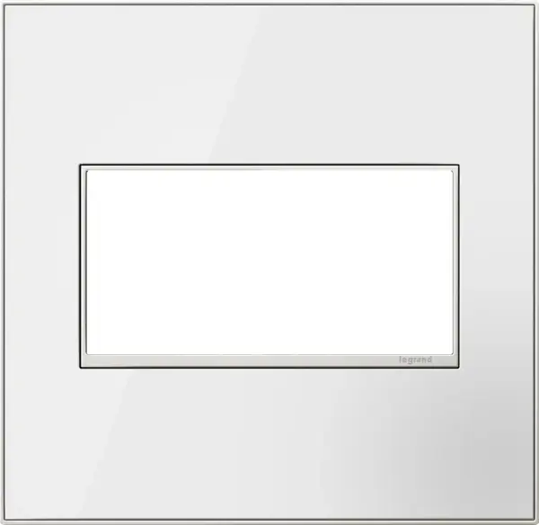 Perfect for lovers of minimalist dÃcor, while featuring a fun futuristic vibe too. A 2-Gang Wall Plate, it is perfectly sized to fit any combination of up to two standard-sized adorne devices, or up to four half-sized adorne designer switches and outlets. Collection: adorne Finish: Mirror White Width: 5.29" Height: 5.13" Length: 0.35" Weight: 0.68 lb Extension from Wall: 0.35" Material: Real Materials Country of Origin: Mexico Connection: Screwless Manufacturer Warranty: Limited Lifetime