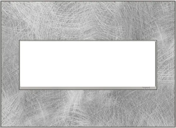 Sweeping strokes of monochromatic texture make this steel option all the more noteworthy. A 2-Gang Wall Plate, it is perfectly sized to fit any combination of up to two standard-sized adorne devices, or up to four half-sized adorne designer switches and outlets. Collection: adorne Finish: Spiraled Stainless Width: 7.06" Height: 5.13" Length: 0.35" Weight: 0.59 lb Extension from Wall: 1.19" Material: Real Materials Country of Origin: Mexico Connection: Screwless Manufacturer Warranty: Limited Lifetime