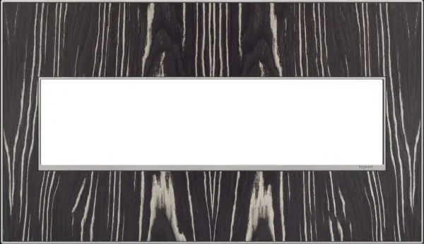 Beautiful and exotic ebony wood, and guaranteed to enhance the look and atmosphere of any room. A 3-Gang Wall Plate, it is perfectly sized to fit any combination of up to three standard-sized adorne devices, or up to six half-sized adorne designer switches and outlets. Collection: adorne Finish: Macassar Width: 8.88" Height: 5.13" Length: 0.35" Weight: 0.70 lb Extension from Wall: 1.00" Material: Real Materials Country of Origin: Mexico Connection: Screwless Manufacturer Warranty: Limited Lifetime