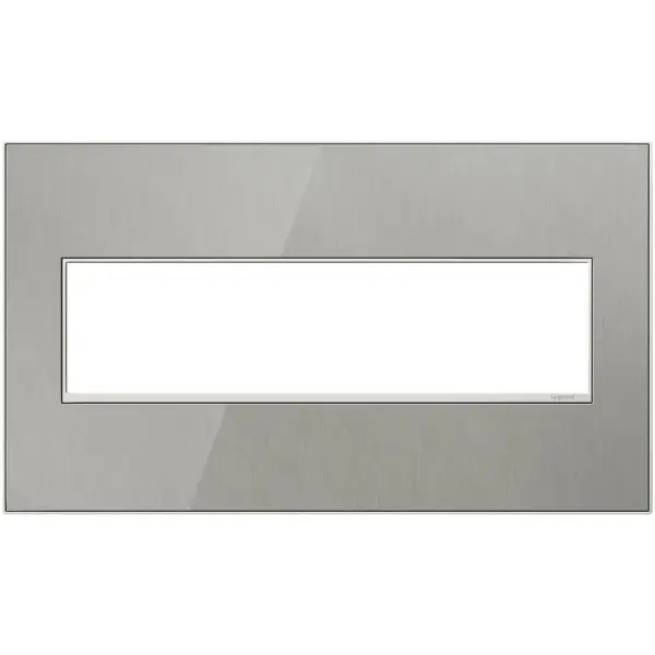 Stainless surface with satin nickel frame, for a trendy industrial touch that€s also sophisticated. A 1-Gang Wall Plate, it is perfectly sized to fit a standard-sized adorne device, or any combination of two half-sized adorne designer switches or outlets. Collection: adorne Finish: Brushed Stainless Notes: Brushed Stainless 4 Gang Wp Width: 8.88" Height: 5.13" Length: 0.35" Weight: 1.22 lb Extension from Wall: 1.19" Bulb Type: tbn Material: Real Materials Country of Origin: Mexico Connection: Screwless Manufacturer Warranty: Limited Lifetime