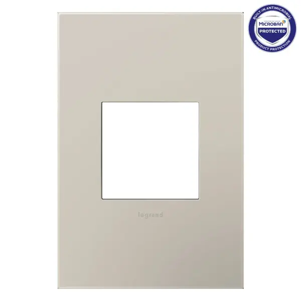 A cool neutral tone, primed to create an equally cool vibe. Made exclusively for use with designer switches and outlets from the adorne Collection.This wall plate features enduring Microban antimicrobial technology that works to reduce the growth of bacteria, around the clock, for the lifespan of the product. Existing inventory of switches, dimmers and plastic wall plates from the adorne Collection at some partner locations may not yet include Microban protection. To confirm that a specific Legrand product is protected with Microban, check that the exterior of the product packaging includes a green dot or a ""Protected with Microban"" label.No antimicrobial efficacy claims are being made or are valid with respect to products sold in Canada. Collection: adorne Finish: Greige Width: 3.45" Height: 5.13" Length: 0.35" Weight: 0.53 lb Extension from Wall: 0.35" Material: Polycarbonate Country of Origin: Mexico Connection: Screwless Manufacturer Warranty: Limited Lifetime