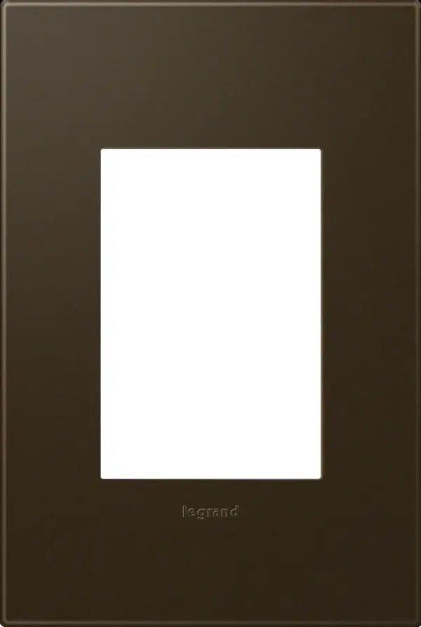 A rich complement to stately shades and earth tone, with a hint of warmth. Made exclusively for use with designer switches and outlets from the adorne Collection.This wall plate features enduring Microban antimicrobial technology that works to reduce the growth of bacteria, around the clock, for the lifespan of the product. Existing inventory of switches, dimmers and plastic wall plates from the adorne Collection at some partner locations may not yet include Microban protection. To confirm that a specific Legrand product is protected with Microban, check that the exterior of the product packaging includes a green dot or a ""Protected with Microban"" label.No antimicrobial efficacy claims are being made or are valid with respect to products sold in Canada. Collection: adorne Finish: Bronze Notes: Bronze -1 Gang/3 Module Wall Plates Width: 3.45" Height: 5.13" Length: 0.35" Weight: 0.33 lb Extension from Wall: 0.35" Bulb Type: tbn Material: Polycarbonate Country of Origin: Mexico Connection: Screwless Manufacturer Warranty: Limited Lifetime