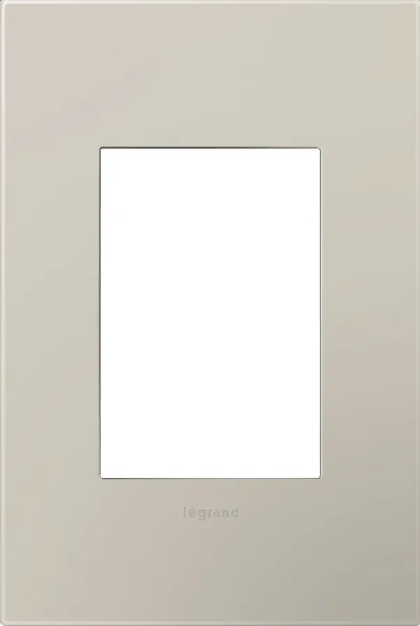 A cool neutral tone, primed to create an equally cool vibe. Made exclusively for use with designer switches and outlets from the adorne Collection.This wall plate features enduring Microban antimicrobial technology that works to reduce the growth of bacteria, around the clock, for the lifespan of the product. Existing inventory of switches, dimmers and plastic wall plates from the adorne Collection at some partner locations may not yet include Microban protection. To confirm that a specific Legrand product is protected with Microban, check that the exterior of the product packaging includes a green dot or a ""Protected with Microban"" label.No antimicrobial efficacy claims are being made or are valid with respect to products sold in Canada. Collection: adorne Finish: Greige Width: 3.45" Height: 5.13" Length: 0.35" Weight: 0.53 lb Extension from Wall: 0.35" Material: Polycarbonate Country of Origin: Mexico Connection: Screwless Manufacturer Warranty: Limited Lifetime