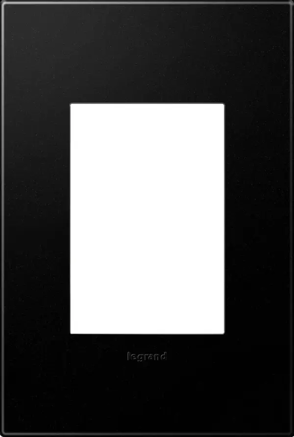 Dark, handsome and a little bit mysterious, it is perfect for adding on-trend edge to any space. Made exclusively for use with designer switches and outlets from the adorne Collection.This wall plate features enduring Microban antimicrobial technology that works to reduce the growth of bacteria, around the clock, for the lifespan of the product. Existing inventory of switches, dimmers and plastic wall plates from the adorne Collection at some partner locations may not yet include Microban protection. To confirm that a specific Legrand product is protected with Microban, check that the exterior of the product packaging includes a green dot or a ""Protected with Microban"" label. Collection: adorne Finish: Graphite Notes: Graphite- 1 Gang /3Mod Wall Plate Width: 3.45" Height: 5.13" Length: 0.35" Weight: 0.33 lb Extension from Wall: 0.35" Bulb Type: tbn Material: Polycarbonate Country of Origin: Mexico Connection: Screwless Manufacturer Warranty: Limited Lifetime