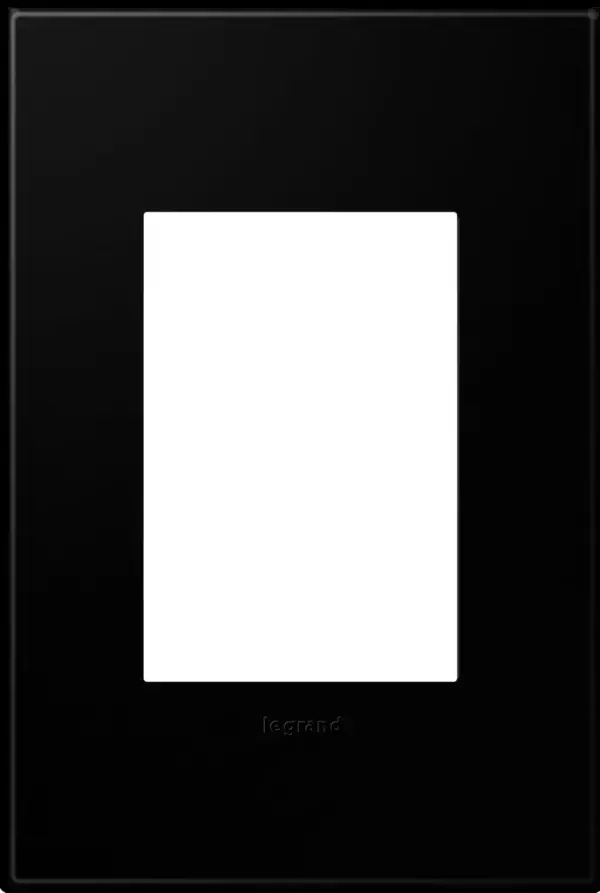 A strong, chic matte black to match darker hardware or strikingly contrast lighter shades/metals. A 1-Gang Wall Plate, it is perfectly sized to fit a standard-sized adorne device, or any combination of two half-sized adorne designer switches or outlets. Collection: adorne Finish: Black Ink Width: 3.45" Height: 5.13" Length: 0.35" Weight: 0.53 lb Extension from Wall: 0.35" Material: Polycarbonate Country of Origin: Mexico Connection: Screwless Manufacturer Warranty: Limited Lifetime