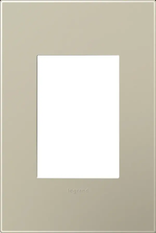 Subtle but lustrous, this finish is charismatic enough to fit in anywhere. Made exclusively for use with designer switches and outlets from the adorne Collection.This wall plate features enduring Microban antimicrobial technology that works to reduce the growth of bacteria, around the clock, for the lifespan of the product. Existing inventory of switches, dimmers and plastic wall plates from the adorne Collection at some partner locations may not yet include Microban protection. To confirm that a specific Legrand product is protected with Microban, check that the exterior of the product packaging includes a green dot or a ""Protected with Microban"" label.No antimicrobial efficacy claims are being made or are valid with respect to products sold in Canada. Collection: adorne Finish: Titanium Notes: Titanium - 1 Gang/3Module Wall Plates Width: 3.45" Height: 5.13" Length: 0.35" Weight: 0.33 lb Extension from Wall: 0.35" Bulb Type: tbn Material: Polycarbonate Country of Origin: Mexico Connection: Screwless Manufacturer Warranty: Limited Lifetime