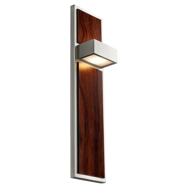 The Guapo Wall Sconce combines sophisticated minimalist design with the natural warmth of walnut wood. Its dual-directional lighting creates beautiful ambient glow while the satin nickel finish adds modern elegance. - alternate view
