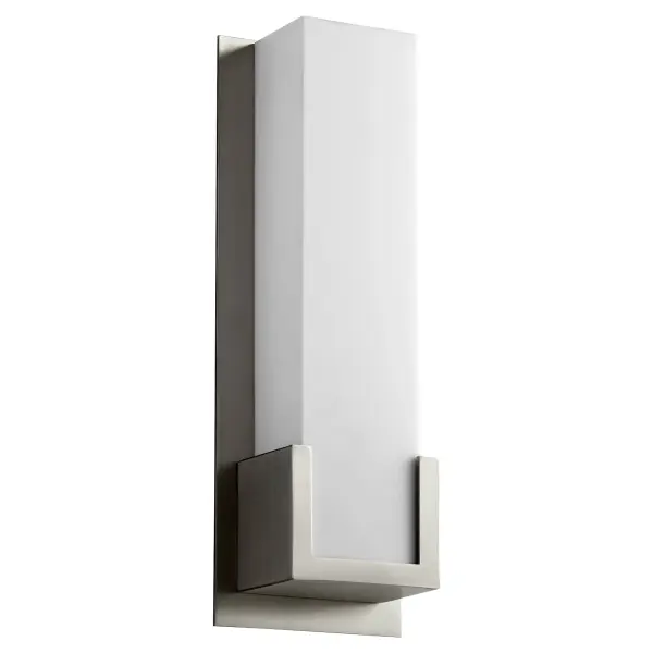 The Orion Wall Sconce delivers clean, contemporary design with purposeful angles and soft diffused light through matte white acrylic. Dimmable and damp-rated, it's ideal for modern bathrooms, hallways, and commercial spaces.