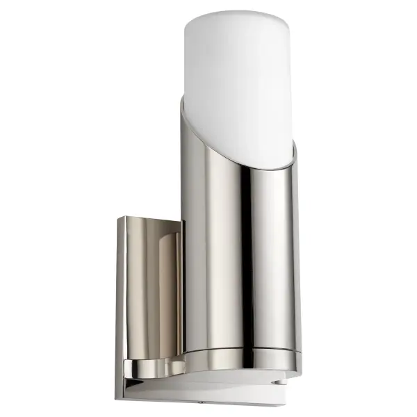 The Ellipse wall sconce delivers clean, modern lighting with its cylindrical glass silhouette and polished nickel finish. Perfect for hallways, entryways, and bathrooms where refined simplicity meets functional illumination.