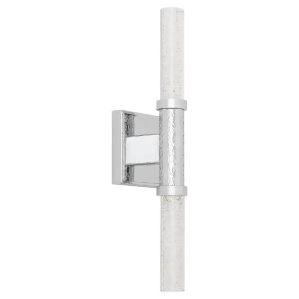 The Monet LED Sconce brings artistic sophistication to contemporary spaces with its textured glass and metal design inspired by Impressionist pointillism. Energy-efficient LED technology meets timeless style in polished chrome.