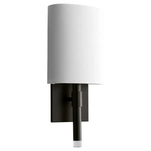 The Beacon wall sconce combines a bold square backplate with a semi-transparent fabric accent and white diffuser for sophisticated ambient lighting. The Old World finish adds traditional warmth to any space.