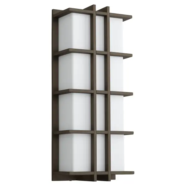 The Telshor Large wall sconce delivers striking architectural presence with vertical fin detailing and warm LED illumination. Wet-rated and dimmable, it combines modern design with durability for outdoor applications.