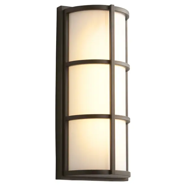 The Leda Small sconce combines modern aesthetics with functional outdoor lighting. Its matte white acrylic diffuser and oiled bronze brackets create a sophisticated look while providing gentle, even illumination. - alternate view