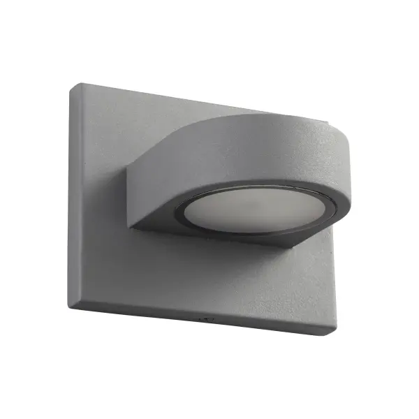 The Eris Small wall sconce delivers distinctive triangular illumination through its frosted glass diffuser, casting light both upward and downward. Its geometric contemporary design and indoor-outdoor versatility make it ideal for modern spaces.