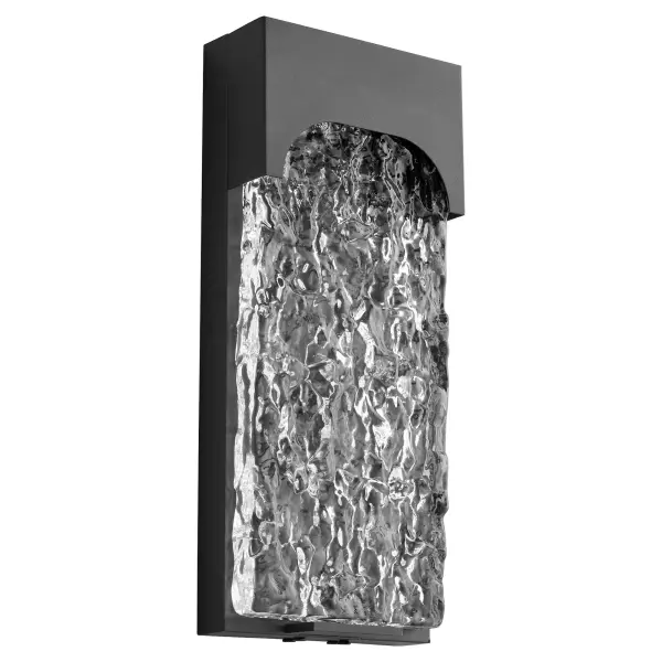 The NITRO Wall Sconce delivers contemporary architectural presence with its chiseled glass diffuser and sleek black finish. Wet-rated for durability and powered by energy-efficient 7.7W LED with TRIAC dimming capability.