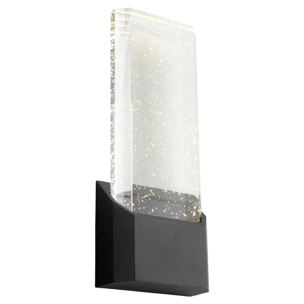 The Esprit wall sconce makes a striking statement with its clear bubble crystal glass diffuser that creates dramatic light projections. Wet-rated for durability and designed for outdoor use, this fixture combines modern aesthetics with practical performance. - alternate view