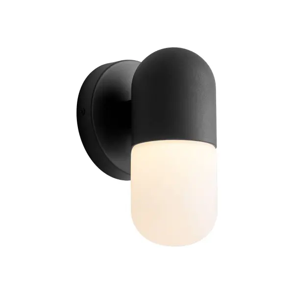 The Corpus Small Lantern delivers contemporary style with its sleek black finish and crisp white glass diffuser. Perfect for modern outdoor spaces, this compact fixture provides warm 3000K lighting with bold visual impact. - alternate view