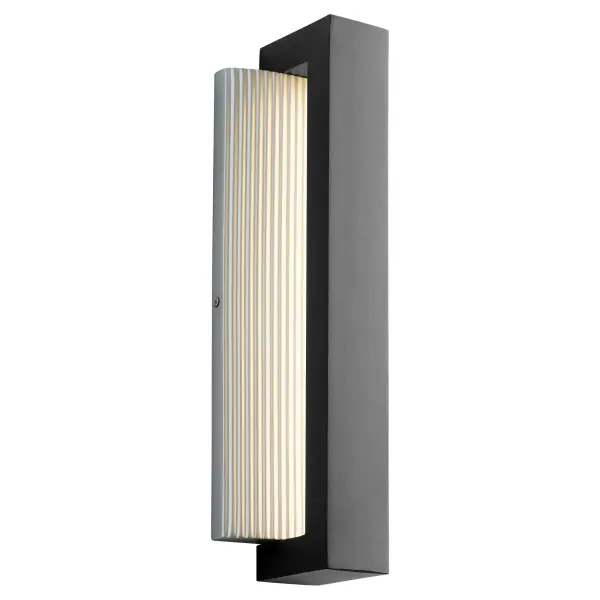 The Verve 18" Wall Sconce delivers striking modern design with its ribbed diffuser and contrasting black-aluminum frame. Wet-rated LED technology makes it ideal for outdoor facades and covered patios, while its architectural presence elevates contemporary interiors and commercial corridors. - alternate view